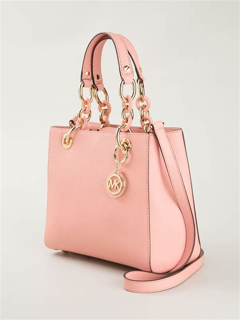 michael kors pink tote bags.